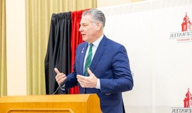 Peter Koutoujian speaks from a podium.